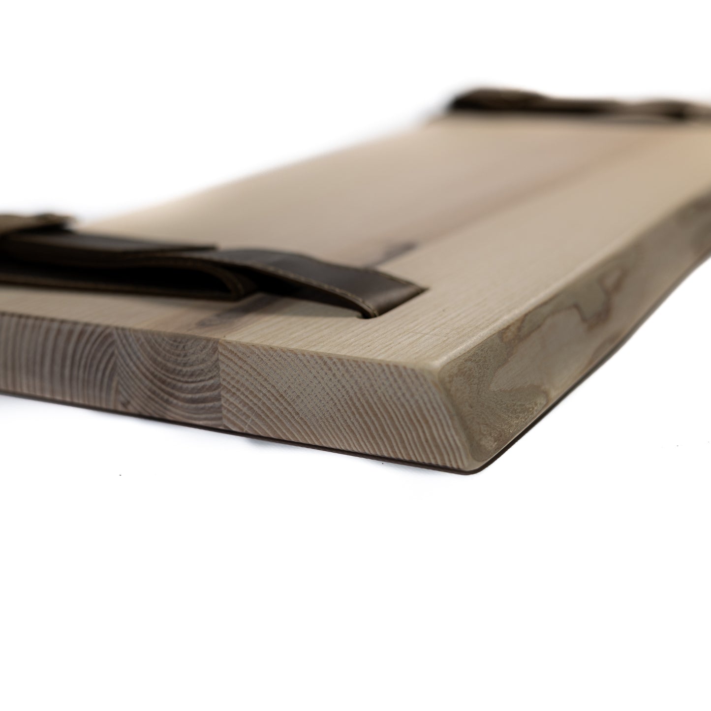 Light pine birch bark shelf close-up on white surface